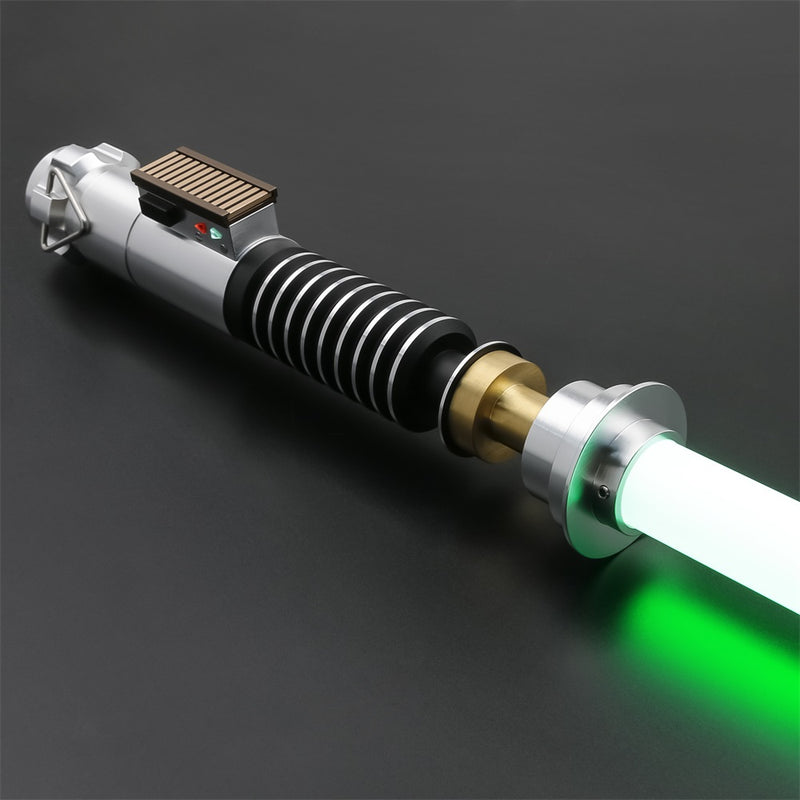 silver and gold hilted lightsaber with light green blade